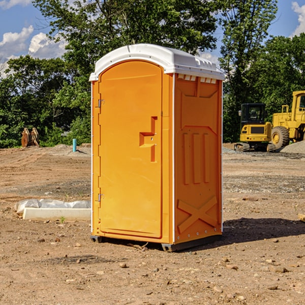 how often are the portable restrooms cleaned and serviced during a rental period in Booth AL